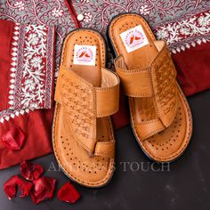 Introduction: Step into tradition and style with our meticulously crafted Kolapuri Ethnic Spartan Design Sandals for men. Handmade with care and attention to detail, these sandals are the epitome of comfort, durability, and timeless elegance.  Crafted from premium soft leather in a classic tan color, these sandals are not only stylish but also skin-friendly, ensuring maximum comfort even during extended wear. The traditional Kolapuri design is adorned with intricate detailing, adding a touch of Traditional Brown Cutdana Wear, Traditional Sandals With Single Toe Strap For Festive Occasions, Traditional Closed Toe Toe Ring Sandals For Festivals, Traditional Festive Sandals With Single Toe Strap, Traditional Slip-on Sandals For Festivals, Festive Closed Toe Sandals For Puja, Traditional Open Toe Sandals For Festivals, Traditional Toe Ring Sandals For Festivals, Traditional Festive Sandals For Puja