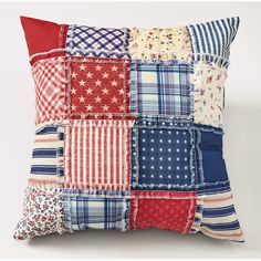 a red, white and blue patchwork pillow with stars on the front is shown