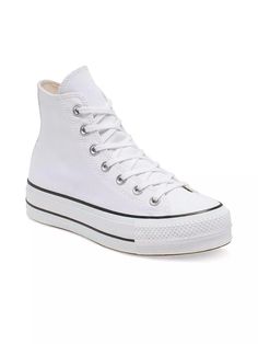 A canvas upper and double-stacked sole elevates Converse's iconic high-top look. With classic Chuck Taylor All Star design elements, like a star ankle patch and All Star license plate on the heel..Textile upper.Round toe.Lace-up style.Lining: Textile.Rubber sole.Imported.SIZE.Platform height, 1.5' (42mm).Please note: Runs half a size large..This brand fits slightly larger. Consider ordering half a size down..A canvas upper and double-stacked sole elevates Converse's iconic high-top look. With classic Chuck Taylor All Star design elements, like a star ankle patch and All Star license plate on the heel.Textile upperRound toeLace-up styleLining: TextileRubber soleImported SIZEPlatform height, 1.5' (42mm) Please note: Runs half a size large.This brand fits slightly larger. Consider ordering ha Converse Cotton Platform Sneakers With Round Toe, Converse High-top Canvas Platform Sneakers, White Platform High-top Sneakers, Converse Platform Canvas Shoes, High-top Cotton Platform Sneakers With Vulcanized Sole, High-top Cotton Canvas Shoes With Platform, High-top Platform Canvas Shoes, Canvas High-top Sneakers With Platform And White Sole, High-top Canvas Platform Sneakers