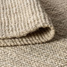 closeup of the texture of a knitted blanket, which has been folded over