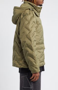 This streetwear-inspired, hip-length puffer jacket features heat-pressed chevrons for a modern look and an adjustable hood for extra weather protection. 27 1/2" length (size Medium) Adjustable toggle hood Lined 100% polyester Dry clean or machine wash, line dry Imported Quilted Jacket With Double-lined Hood For Outdoor Fall Activities, Quilted Jacket With Double-lined Hood For Fall Outdoor Activities, Quilted Jacket With Double-lined Hood For Fall Outdoor, Fall Outdoor Quilted Jacket With Double-lined Hood, Sporty Quilted Hooded Puffer Jacket, Functional Spring Puffer Jacket For Streetwear, Spring Functional Streetwear Puffer Jacket, Spring Functional Puffer Jacket For Streetwear, Hooded Nylon Quilted Jacket For Streetwear