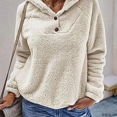 Peilia - Introducing our Solid Button Pullover Plush Hoodie: a stylish and cozy addition to any womans wardrobe, featuring long sleeves and a comfortable sweatshirt design. Women's Hoodies, Sweatshirts Online, Women Hoodies Sweatshirts, Women's Wardrobe, Short Sleeve Button Up, Sweatshirt Designs, Sweatshirt Hoodie, Long Sleeve Hoodie, Long Sleeve Sweater