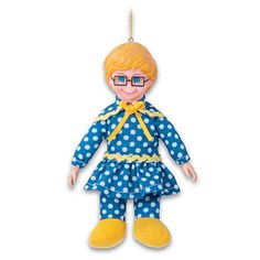 a blue and white polka dot doll ornament with glasses on it's head