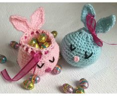 two crocheted easter bunnies sitting next to each other