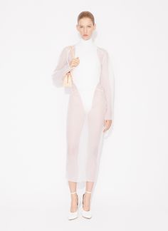 ALAÏA Women's Coat Dress | ALAÏA US Stretch Turtleneck Midi Dress For Party, Spring Mesh Dress With Sheer Stretch Sleeves, Sheer Polyamide Evening Dress, Chic Stretch Dress With Sheer Sleeves, Chic Dress With Sheer Sleeves And Stretch, Chic Sheer Dress In Polyamide, Chic Sheer Polyamide Dress, Chic Sheer Stretch Mesh Dress, Elegant White Turtleneck Dress