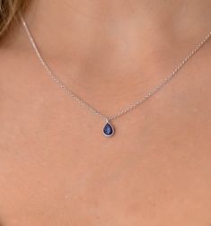 This dainty Sapphire pendant necklace has a delicate silver chain. The chain is solid sterling silver 925., and there is an extension so that the size can be adjusted. There are different stonees to choose from. The stones are natural stones and no 2 are identical, but they are similar. If you would like a custom order or have any questions please contact me, thanks. Delicate Sterling Silver Drop Necklaces, Delicate Teardrop Sterling Silver Charm Necklace, Delicate Sterling Silver Drop Necklace, Silver Teardrop Charm Necklace With Delicate Chain, Sterling Silver Drop Necklace In Delicate Style, Sterling Silver Teardrop Charm Necklace With Delicate Chain, Sterling Silver Teardrop Birthstone Charm Necklace, Sterling Silver Teardrop Drop Necklace With Delicate Chain, Silver Drop Charm Necklaces With Clavicle Chain