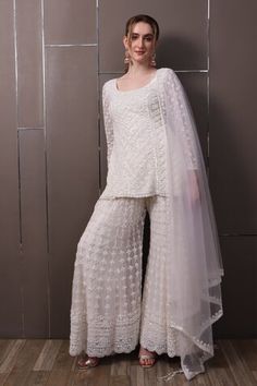 Off-white organza kurta with floral, thread and sequins hand embroidery. Comes with palazzo and a dupatta. - Aza Fashions White Organza Palazzo Set For Party, Organza Palazzo Set With Chikankari Embroidery For Receptions, Off White Sets With Chikankari Embroidery For Party, White Organza Palazzo Set For Wedding, White Pearl Embroidered Dupatta, Wedding Embellished Organza Palazzo Set, Festive White Sets With Pearl Embroidery, White Palazzo Set With Dupatta For Party, White Georgette Dupatta With Pearl Embroidery