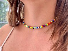 A simple and elegant mixed opaque multi-color beads necklace.  It can be used as a choker or collarbone necklace, which would be an excellent gift for any occasion! The length of the necklace is 14 inches plus 2 inches of chain extension Thank you for supporting me as an artist. I put my creativity and love into every product I make. When you buy handmade, you are buying much more than a thing; you are buying hours of experimentation and days of work; you are purchasing a piece of the human hear Casual Multicolor Round Beads Choker, Multi Colour Necklace, Collarbone Necklace, Dainty Choker Necklace, Beads Choker, Multi Coloured Necklaces, Beach Necklace, Dainty Choker, Necklace Cute