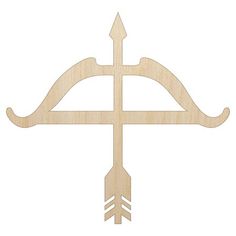 a wooden cross with an arrow on the front and back side, cut out from wood