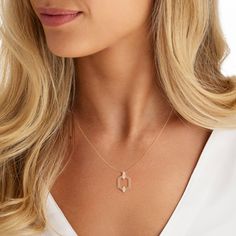 This 18ct rose gold Nectar pendant has perfectly balanced accents hand set with rare white diamonds. DETAILS Total Weight of Diamonds: 0.11ctsChain: Split 18ct Rose Gold chainChain Length: 40.6cm - 45.7cm (16" - 18")Pendant Measurement: 2.3cm by 1.3cm (approximately) Infinity Pendant, Rose Gold Pendant, Diamond Set, Rose Gold Diamonds, White Diamonds, Diamond White, Gold Pendant, Gold Diamond, Timeless Design