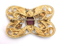 Gorgeous Antique Art Nouveau Gilted Brooch Large Amethyst Stone Center Art Nouveau Gold Brooch With Cabochon, Victorian Jeweled Gold Brooches, Victorian Gold Brooches With Jewels, Ornate Jeweled Gold Brooches, Ornate Gold Jeweled Brooches, Antique Gold Brooches With Jewels, Ornate Gold Brooches With Jewels, Gold Cabochon Brooches For Jewelry Making, Snake Skin Handbag