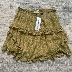 Urban Outfitters Ruffle Mini Olive Print Skirt Size Small Nwt Retail $69 On Tag Fully Lined Selling Other Patterns Too Look At Other Listings For More Casual Flowy Skirt With Ruffle Hem, Flowy Casual Skirt With Ruffle Hem, Casual Flowy Bottoms With Ruffles, Casual Flowy Ruffled Bottoms, Casual Flowy Bottoms For Brunch, Summer Flowy Ruffled Mini Skirt, Flowy Ruffled Casual Bottoms, Flowy Ruffled Mini Skirt For Summer, Summer Bottoms With Ruffles And Mini Hem