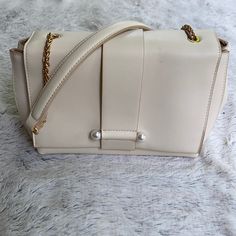 A New Day Faux Leather Pearl Shoulder Handbag. Nwt. There Is A Small Mark On The Front, Shown In Last Photo. The Tag Is White But Is Actually A Cream Color Magnetic Closure Back Pocket Inner Zip Pocket Snap Buttons On The Side Approximate Dimensions: 10”W X 6”H X 4.25”D Will Ship The Same/ Next Day M-F. Chic Cream Box Bag For Everyday Use, White Flap Bag With Large Capacity, White Large Capacity Flap Bag, Beige Satchel Flap Bag With Magnetic Closure, White Large Capacity Crossbody Flap Bag, Beige Rectangular Satchel With Magnetic Closure, Cream Box Bag For Everyday Use, Classic White Box Clutch Bag, Elegant Cream Satchel Box Bag