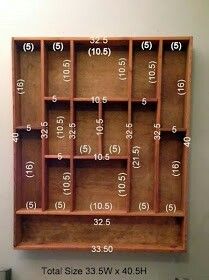 a wooden shelf that has numbers on it