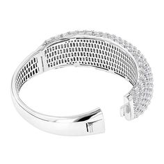 This breathtaking and very unique designer Diamond Bangle Bracelet for Women weighs approximately 50 grams and showcases 12 carats of sparkling baguette cut beautiful diamonds masterfully prong set in luxurious and shiny 14K gold. Featuring a glamorous design and a highly polished gold finish, this fabulous ladies diamond bangle bracelet is available in white, yellow and rose gold. Luxury Diamond Cut White Bangle, Evening Diamond Bangle Bracelet, Evening Diamond Cut Diamond Bracelets, Luxury Diamond Bangle With Baguette Diamonds, Elegant Diamond Bangle With Baguette Diamonds, Luxury Baguette Diamond Bangle For Formal Events, Luxury Baguette Cut Bangle For Formal Occasions, Silver Baguette Diamond Bangle Bracelet, Silver Bangle Diamond Bracelet With Baguette Diamonds