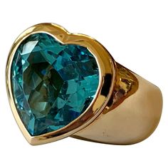 One of a kind solid 18 K rose Gold Ring set with a heart shaped blue Topaz. This unique piece has been designed and handcrafted from the very well known swiss company "Sueños". The owners, Mr and Mrs Rueegg are are highly appreciated by jewellery lovers only looking for the best. Sueños stands for the spanish word dreams and this is exactly what they want to deliver. Contemporary and wearable jewellery creations and designs, custom made for the sophisticated and discerning clientele. All is excl Unique Ring Designs, Rose Gold Ring Set, K Rose, Genie Bottle, Modern Heart, Heart Shaped Jewelry, Gold Ring Sets, Pretty Rings, Blue Heart