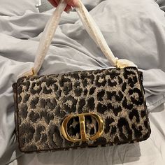 Medium Caro In Velvet Leopard Print. Original Packaging, But No Box. The Condition Is 10/10. This Is Absolutely Stunning In Person The Video Doesn’t Do It Justice! Light Luxury Rectangular Shoulder Bag With Gold-tone Hardware, Rectangular Light Luxury Shoulder Bag With Gold-tone Hardware, Designer Handheld Box Bag With Gold-tone Hardware, Luxury Brown Box Bag With Branded Hardware, High-end Gold Tote Box Bag, Designer Gold Tote Box Bag, Light Luxury Brown Shoulder Bag With Gold-tone Hardware, Luxury Gold Bag With Detachable Strap, Designer Gold Box Bag With Double Handle