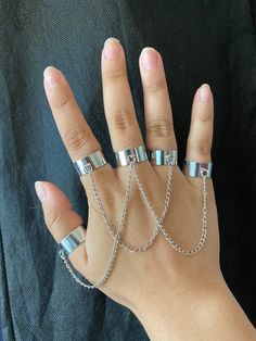 Five chain linked rings that can be worn in any way. The rings are adjustable, so one size fits all. Rings With Chains, Ring Chain Bracelet, Ring With Chain, Linked Rings, Finger Cuff, Chains Aesthetic, Rings Chain, Hand Chain Jewelry, Chain Rings