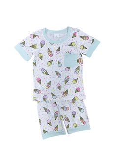 Sweet dreams are made of our Ice Cream All Night Girls Short Sleeve Pajama Set! Featuring a delightful ice cream cone pattern on a crisp white background with mint green trim, this set is both fun and stylish. Made from soft, breathable fabric, it ensures a cozy and comfortable sleep. Perfect for your little one's sweetest nights. And be sure to check out our other must have new arrivals. INCLUDES: 2 Piece Pajama Set FIT: This item is true to size FABRIC & CARE: Cotton/poly blend Machine washabl Cute Green Cotton Sleepwear, Playful White Cotton Sleepwear, Playful Bedtime Sets For Spring, Playful White Summer Sleepwear, White Summer Sleepover Set, Playful Fitted Sets For Sleepovers, Fun White Pajama Party Sets, Playful White Pajama Party Sleepwear, Fun White Sets For Pajama Party