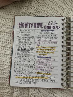 an open notebook with writing on it and the words how to have self - confidence