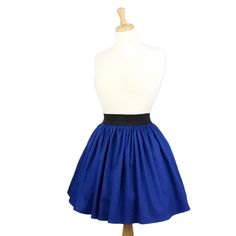 Electric Cobalt Blue A-line Pleated Skirt pairs nicely with any blouse. Achieve an effortless showstopping Summer look with a crop top and this cobalt colored skirt. A petticoat and rockabilly inspired platforms will dress it up for nights on the go. With this skirt, the day and night is yours! The assortment of pleats on the skirt gives it the wonderful 50's inspired silhouette and the black elastic guarantees vast stretch for comfort. Enjoy! * Please note Mannequin is wearing a petticoat under Blue Cotton Skirt, Elastic Skirt, Yellow Cardigan, Summer Look, Cotton Skirt, Day And Night, Petticoat, Unique Print, Summer Looks