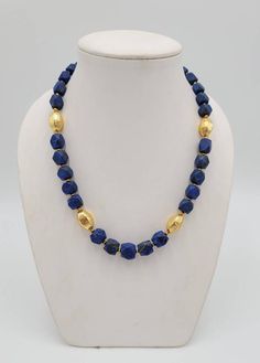 It's Beautiful Natural Lapis Lazuli Stone Beads Necklace With Gold Plated Beads In Between its Totally Handmade Necklace Its Wonderful Necklace Beautiful Color Lapis Lazuli Stone From AfghanistanMaterial Gold PlatedGemstone Lapis LazuliLength 54cm Lapis Lazuli Beaded Necklaces With Large Beads As Gift, Lapis Lazuli Beaded Necklace With Large Beads For Gift, Traditional Jewelry With Round Lapis Lazuli Beads, Lapis Lazuli Beaded Necklace With Faceted Beads For Gift, Lapis Lazuli Gemstone Beads For Jewelry Making, Gold Lapis Lazuli Jewelry With Polished Beads, Traditional Lapis Lazuli Round Bead Necklace, Traditional Lapis Lazuli Bead Necklace, Lapis Lazuli Faceted Round Bead Necklaces