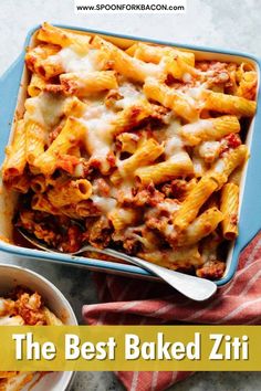 the best baked ziti is in a blue casserole dish