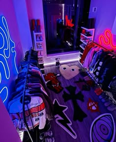 a room filled with clothes and neon lights