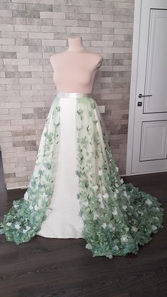 Flower embroidered light green tulle detachable wedding skirt with train - an elegant adding to your wedding gown can be matched with different styles wedding gowns and tops. Also, the skirt can be ordered in full, with Royal satin underneath skirt, Tulle crinoline and Lining. Please select all your preferred options and indicate your size at checkout. Kindly note that this listing is for the skirt presented in the first pictures. In case you are interested to buy one of optional items from the Detachable Wedding Skirt, Wedding Overskirt, Bridal Skirt Separate, Wedding Train, Train Skirt, White Flower Wedding, Unreal Unearth, Bridal Skirt, Wedding Cloak