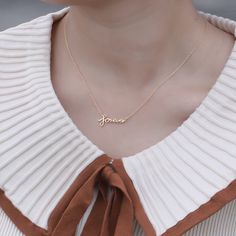 This dainty cutout text necklace features the word ""forever"" in lowercase, a fresh take on the traditional script font necklace, this necklace features a unique freestyle font script. 
   This one-piece necklace is hand-crafted using 18K gold plated sterling silver.  Chain: Length:15.3" Pendant: Length: 0.28"    18K gold plated sterling silver  One-piece necklace  Lobster claw closure Perfume Clean, Silver One Piece, Leisure Wear Women, Wedding Sunglasses, Briefcase For Men, Forever Yours, Womens Crossbody Bag, Script Font, Lowercase A