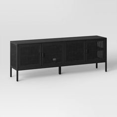 a black sideboard with two doors and one door open, on a white background