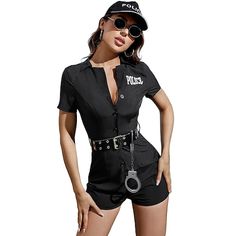 a woman in short shorts and shirt with handcuffs on her belt is posing for the camera