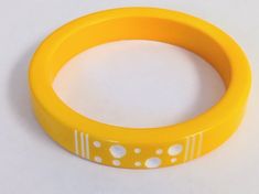 Vintage Yellow Polka Dot Carved Celluloid Bangle/ Bracelet MCM Vintage Yellow Round Bracelets, Retro Yellow Adjustable Bracelets, Retro Yellow Bangle Bracelet, Retro Yellow Bangle Bracelets, Yellow Retro Bracelet As Gift, Lucite Bracelets, Black Evening Bag, Butter Yellow, Yellow Polka Dot