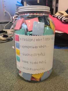 a jar filled with lots of sticky notes