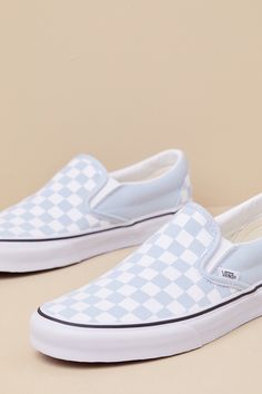 You'll reach for the Vans Classic Baby Blue & White Checkerboard Slip-On Sneakers time and time again when you want to create casually cool looks! These timeless sneakers have a sturdy canvas construction that creates a sleek silhouette with a rounded toe upper, elastic gussets at the sides, and a low-cut, padded collar. Iconic baby blue & white checkerboard design accents throughout. The effortless slip-on design makes these shoes essential when you have places to go and things to do! Logo tag Shoes Essential, Timeless Sneakers, Cool Looks, Blue Vans, Logo Tag, Vans Sneakers, Flat Sneakers, Vans Classic, Slip On Sneakers