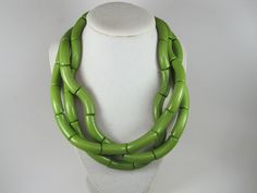 "Chunky olive green necklace, multi strand statement green necklace, beaded necklace, big olive green beads, green statement jewelry, matching earrings, BEST SELLER 2019 Fashion A bold and dramatic statement necklace featuring acrylic olive green curved tube beads. 3 strands, light weight. Gold plated lobster clasp. Measurements: 18\" (47 cm) plus 3 1/2\" extender. Each piece of jewelry from my shop comes beautifully packaged in box and ready for gift giving. Thank you for shopping at my shop! 3 Green Multi-strand Beaded Necklaces With Large Beads, Green Multi-strand Wooden Beads Jewelry, Green Multi-strand Beaded Necklace With Large Beads, Multi-strand Green Large Beads, Elegant Green Beaded Necklaces With Wooden Beads, Elegant Green Beaded Necklace With Wooden Beads, Elegant Green Wooden Beaded Necklaces, Jewelry Matching, Necklace Big