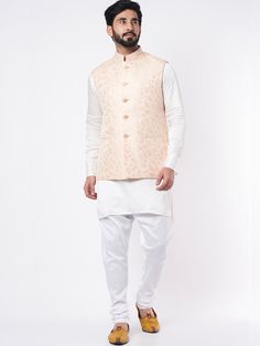 This blush pink silk bundi jacket set will instantly give an elegant look. Made from blended silk fabric, this 3 piece kurta set features a white kurta, blush pink bundi jacket, front buttons fastening, and a mandarin collar. This blush pink jacquard jacket has floral embroidery work all over. It is paired with white churidar. An ideal outfit for traditional occasions, and special events.

Size Chart For Men





	
	
					Men's Size Chart
		

		
		
						
				Size Chart For Men
				Custom Size M Usher Outfits, White Kurta Set, White Churidar, Outfits Pastel, White Kurta, Jacquard Jacket, Broken White, New Address, Indian Fashion Designers