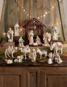 a nativity scene with figurines and lights