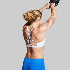 We made our Warrior Sports Bra because a cute, flattering, and strappy back design shouldn't mean your sports bra lacks support. Meet your new workout Warrior—designed for athletic builds, this bra won’t dig in or restrict your movement and provides the perfect amount of coverage and compression through any activity. T-back Sports Bra With Straps For Workout, Functional T-back Sports Bra For Workout, Athletic Fit Sports Bra With Built-in Bra For Training, Cross Back Sports Bra With Built-in Bra For Training, Breathable Strappy Activewear For Training, Sporty T-back Sports Bra For Gym, Sporty Strappy Sports Bra For Yoga, Functional Strappy Activewear For Light Exercise, Fitted Strappy Sports Bra For Training