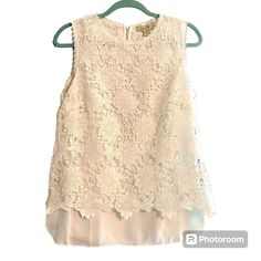 Nwt Charlie Paige White Sleeveless Eyelet Floral Lace Overlay Tunic Top Sz Small So Feminine White Eyelet Lace Overlay On A White Sheer Longer Lining. So Many Ways To Wear This Dressed Up For A Lot Of Occasions To Casual With Shorts And Jeans. Interesting Zipper Closure In The Back, A More Flowy Looser Fit For Ease Of Wear. In Nwt Condition. Size Small Ap To Ap 19.5" Length In Front Approx 27.5" Shell And Lining 100% Poly Please Feel Free To Ask Questions I Will Be Happy To Help. All Nwt Items M Spring Wedding Sleeveless Tank Top, Elegant Sleeveless Lace Top For Summer, Elegant Sleeveless Blouse With Lace Top, Elegant Sleeveless Lace Top Blouse, Sleeveless Summer Tops For Weddings, Sleeveless Tops For Summer Weddings, Sleeveless Summer Wedding Tops, Spring Lace Sleeveless Tank Top, Sleeveless Lace Top For Spring Party