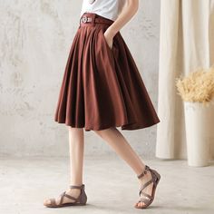 "DETAIL * 50% linen, 50% cotton * Right hidden zipper closure * Knee length * Pockets available * Pleated skirt * Perfect for spring, summer * Wash by hand or machine with cold water * The model is 168 cm (5′ 6″) tall with a 80 cm (31.5\") bust, 66 cm (26\") waist. She is wearing the brown skirt in size XS. Choose CUSTOM Order if you * Need a better fit * Can't find your size in our size Chart * Change the Style * Chang the Length * Your Height is not Between 5'1\" - 5\"9\" * Your weight from 47 Summer Pleated Brown Skirt, Brown A-line Skirt For Summer, Retro Pleated Flared Skirt For Summer, Knee-length Bottoms With Accordion Pleats For Summer, Retro Pleated Mini Skirt For Summer, Summer Knee-length Bottoms With Accordion Pleats, Knee-length Cotton Skirt With Pleated Waist, Retro Pleated Spring Skirt, Retro Pleated Skirt For Summer