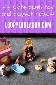 toy animals and toys on the floor with text overlay that says 4 cats plush toy and play set review