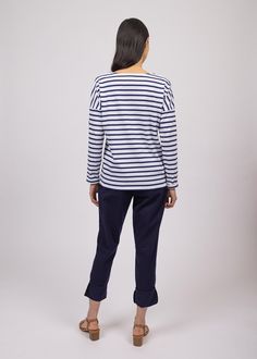 Elevate your French-girl game with this latest addition to our authentic Breton shirt collection! Tailored from our all-time best-seller shirt, MINQUIERS MODERNE, the MINQUIERS DROP features a more relaxed silouhette with dropped shoulders while maintaining the boyfriend fit and comfortable cotton we love. Made in Saint-James, Normandy, France. 100% lightweight cotton jersey. Breton Stripe Shirt, Breton Shirt, Breton Style, Boat Neck Shirt, Nautical Outfits, Breton Stripes, Striped Shirts, Knit Structure, Normandy France