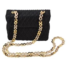 Judith Leiber crossbody bag Black satin with diamond thread pattern Hidden gold snap closure Gold rhinestone infinity chain strap Black satin lining Inner card slot and zippered pocket Comes with black coin purse, gold mirror and blue dust-bag Luxury Bags With Gold Clasp For Formal Occasions, Classic Gold Bag With Chain Detail, Evening Crossbody Shoulder Bag With Chain, Classic Gold Shoulder Bag With Chain, Classic Formal Shoulder Bag With Gold Chain, Gold Bags With Gold Chain In Classic Style, Luxury Formal Bags With Gold Chain, Luxury Chain Bag For Events, Gold Clutch Shoulder Bag For Business