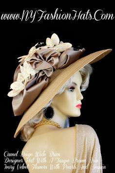 Ladies Camel Beige Tan Wide Brim Designer Kentucky Derby Hat. This Fashion Hat, Is Trimmed With A Large Black Bow, Adorned With Ivory, Beige, Burgundy, And Black Feathers. This Dress Hat, Is Suited For Winter, Spring, Summer Or Fall. A Perfect Special Occasion Hat, For Church, A Wedding, Formals, Holidays, Easter, Horse Racing Events, Horse Races, The Kentucky Derby, The Belmont Stakes, The Preakness, Aqueduct Raceway, And A Tea Party. Custom Made And Designed By NY Fashion Hat Millinery - www.N Special Occasion Hats, Mother Of The Bride Hats, Church Lady Hats, Ladies Dress Hats, Horse Races, Royal Ascot Hats, Belmont Stakes, Occasion Hats, Beige Hat