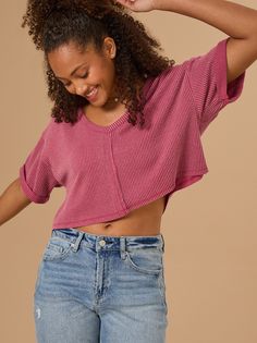 This relaxed ribbed crop top is a must-have for any season. The v-neckline, dolman sleeves, and ribbed detailing are every reason to love this not-so-basic basic top. Trendy V-neck Crop Top For Fall, Ribbed V-neck Top With Relaxed Fit, Trendy Knit V-neck Crop Top, Trendy Cropped Sweater With Ribbed Neckline For Spring, Trendy Ribbed Knit Crop Top, Spring Ribbed Cropped Sweater With Relaxed Fit, V-neck Top With Ribbed Neckline, Spring Ribbed Relaxed Fit Cropped Sweater, Spring Ribbed Cropped Sweater In Relaxed Fit