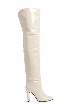 An almond toe and tapered heel balance a striking boot fashioned in an over-the-knee silhouette for statement-making appeal. 3 3/4" heel (size 8.5) 25" shaft; 15 1/4" calf circumference Pull-on style Synthetic upper/leather and textile lining/synthetic sole Imported Chic Cream Knee-high Boots, Fitted Cream Knee-high Heeled Boots, Chic Cream Fitted Knee-high Boots, Chic Fitted Cream Knee-high Boots, Elegant Over-the-knee Heeled Boots For Spring, Cream Knee-high Heeled Boots For Fall, Chic Beige Knee-high Heeled Boots, Chic Beige Thigh-high Boots, Chic Beige Thigh High Boots