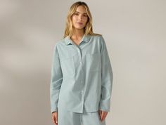 Sleep in pure organic cotton with the Women’s Isla Organic Cotton Long-Sleeve Pajama Set. Gentle on your skin, breathable, and naturally hypoallergenic, this set is made from garment-washed poplin with a percale weave that becomes softer over time. The top features two breast pockets, while the bottom includes two front pockets and a comfortable elastic waistband for a perfect fit. | Coyuchi Women's Isla Organic Cotton Long Sleeve Pajama Set Small Sage with Gulf Relaxed Cotton Sleepwear For Everyday, Organic Cotton Long Sleeve Sleepwear For Spring, Organic Cotton Long Sleeve Tops For Loungewear, Long Sleeve Linen Sleepwear For Relaxation, Spring Organic Cotton Relaxed Fit Sleepwear, Relaxed Fit Organic Cotton Sleepwear For Spring, Relaxed Long Sleeve Cotton Sleepwear, Blue Green Fabric, Sleepwear & Loungewear