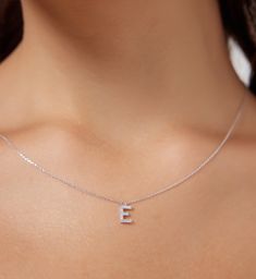 "14K SOLID WHITE GOLD DAINTY INITIAL NECKLACE WITH DIAMONDS Metal : 14K Solid Gold Necklace Length : 16 inches / 40cm Letter Height : 7.20mm Letter Width : 4.80mm Diamond : 14 Diamonds --- Nice White Color Sparkle Diamonds ---- G-H color SI2 clarity Total Carat: 0.08ct to 0.12cts (Depending on the letter) ---MADE IN USA--- ---All letters from A to Z are available. Please indicate your letter choice in the \"notes to seller\" section on the order. ---This is a beautiful 14K Solid White Gold Daint Elegant White Sterling Silver Initial Necklace, Silver Dainty Initial Necklace For Formal Occasion, White Initial Pendant Necklace For Formal Occasions, White Diamond Initial Pendant Necklace As Gift, White Diamond Initial Pendant Necklace, White Diamond Necklace With Initial Pendant, Silver Formal Initial Necklace, Hallmarked White Gold Initial Pendant Necklace, Dainty White Gold Initials Necklace