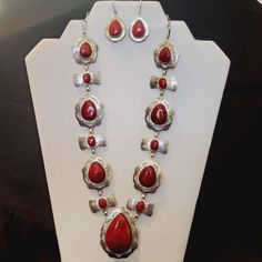 Authentic Red Sponge Coral Necklace & Earrings In Exceptional Decorative 925 Sterling Silver Settings. This Is An Elegant One-Of-A-Kind Necklace & Earrings!! The Stones Are An Exceptional Vibrant Dark Red Color With No Inclusions Or Impurities, W/Smooth Surfaces, Best Clarity, & Of The Highest Quality While Offering Most Reasonable Prices. This Is An Absolutely Stunning Necklace!! Necklace: Hook Style Clasp. Large Tear Drop Stone: 1-1/2" X 2-1/4". Earrings: Oval Stones Are 7/8" X 1-1/8". Elegant Handmade Red Jewelry, Red Dangle Jewelry For Formal Occasions, Elegant Red Sterling Silver Jewelry, Elegant Red Dangle Jewelry, Southwestern Style Red Necklace For Gift, Red Dangle Costume Jewelry, Red Teardrop Jewelry With Matching Earrings, Elegant Red Jewelry With Matching Earrings, Formal Red Jewelry With Matching Earrings